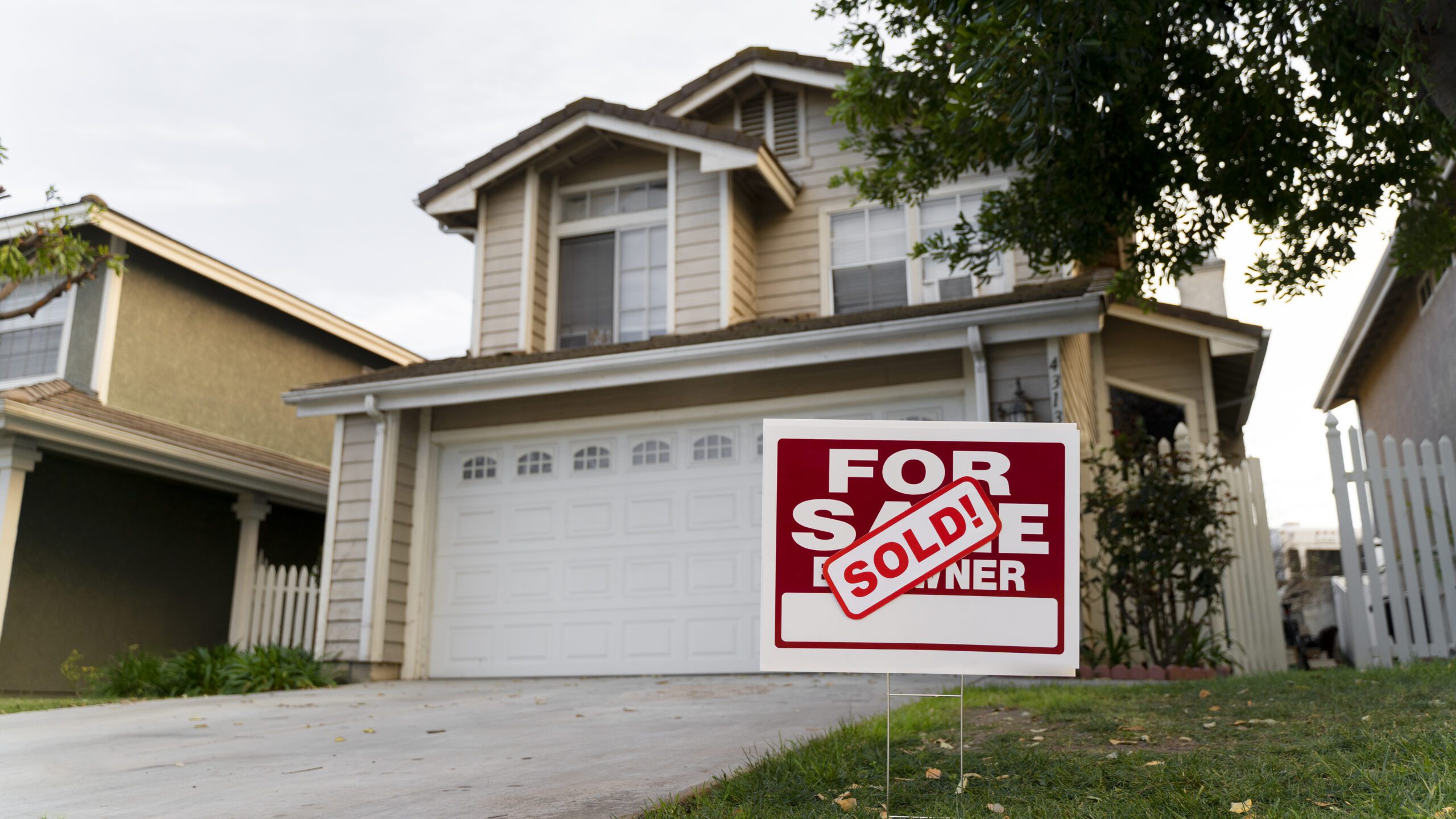 House with “Sold” sign representing the Equity Protection Program for homeowners