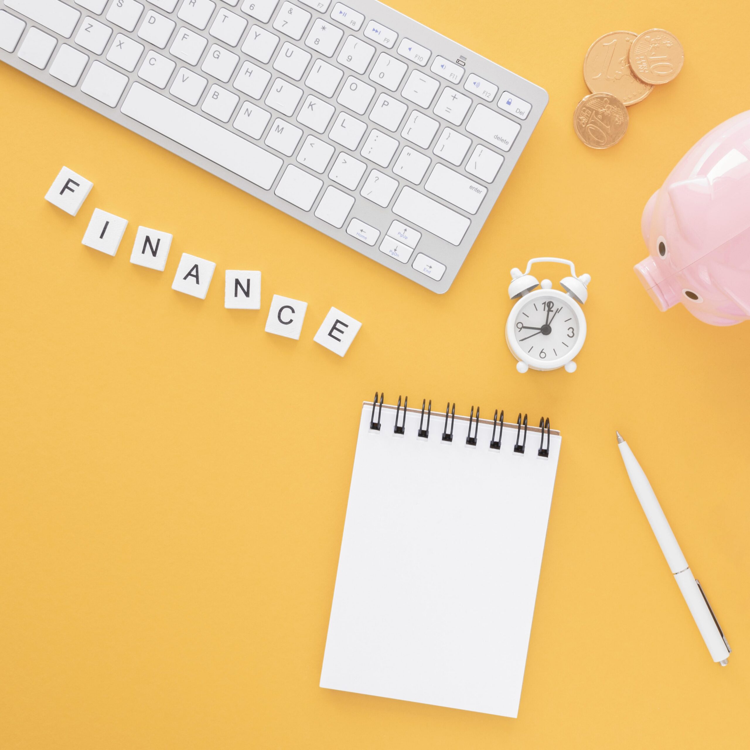 Top View Finance Elements Arrangement With Empty Notepad